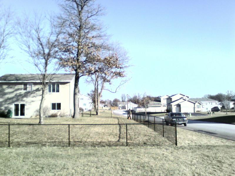 Black vinyl chain link fence installation Minnesota