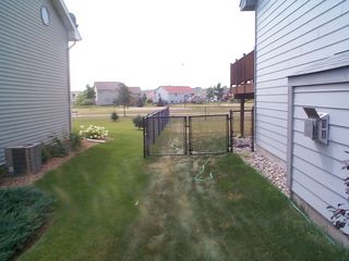Black Vinyl chain link fence installation Minnesota
