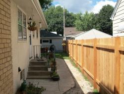 Installation of Cedar Dog-Eared Solid Privacy Fence Minnesota