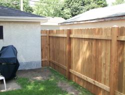 Installation of Cedar Dog-Eared Solid Privacy Fence Minnesota
