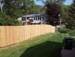 Installation of Cedar Dog-Eared Solid Privacy Fence Minnesota