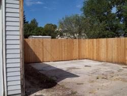 Installation of Cedar Dog-Eared Solid Privacy Fence Minnesota