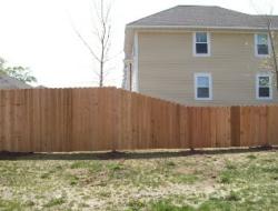 Installation of Cedar Dog-Eared Solid Privacy Fence Minnesota