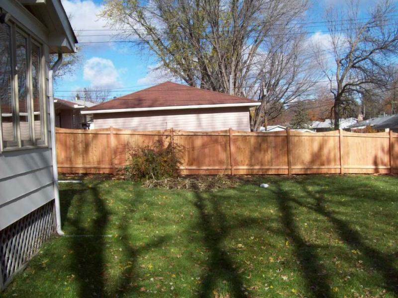 Cedar Scalloped Privacy Fence Installation Minnesota