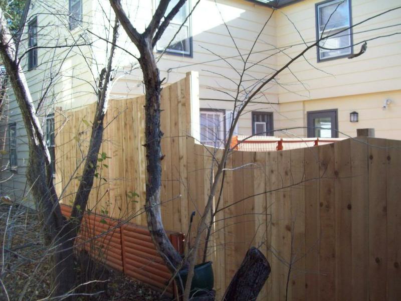 Cedar Scalloped Privacy Fence Installation Minnesota
