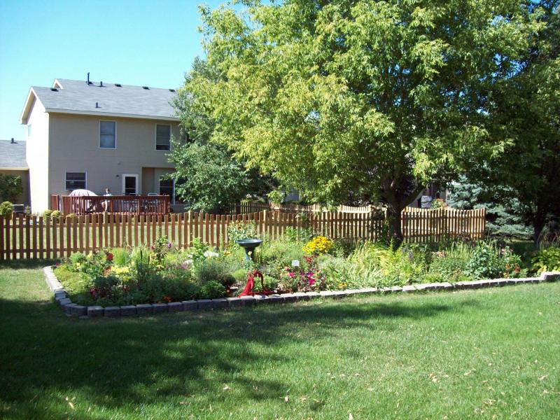 Cedar Scalloped Picket Fence Installation Minnesota